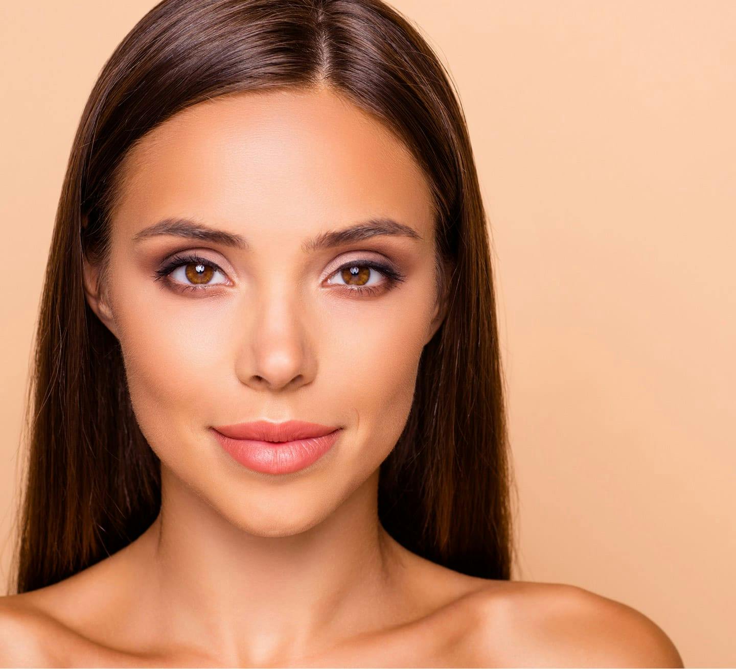 woman looking at camera with a soft smile