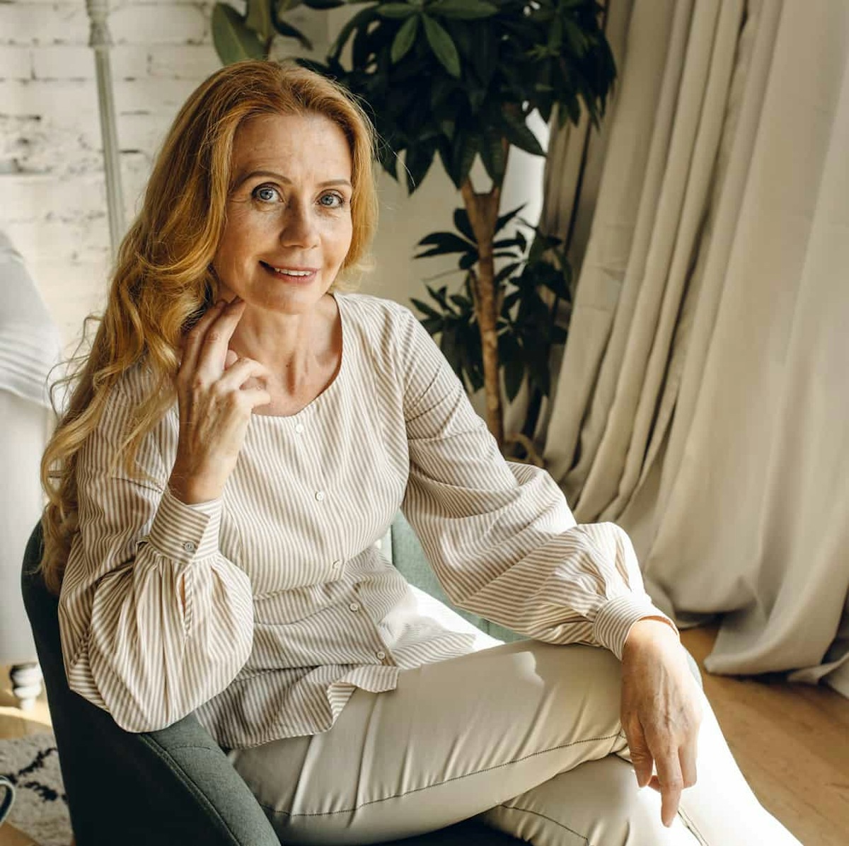 woman in a cream colored outfit