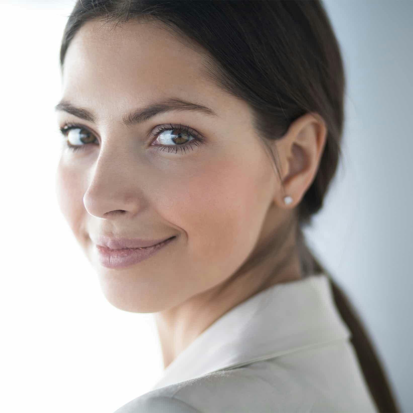 woman with her hair in a ponytail