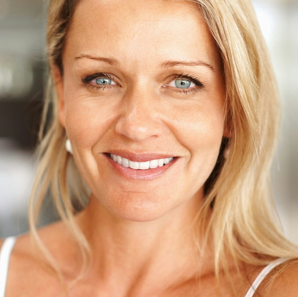 woman with blonde hair and blue eyes