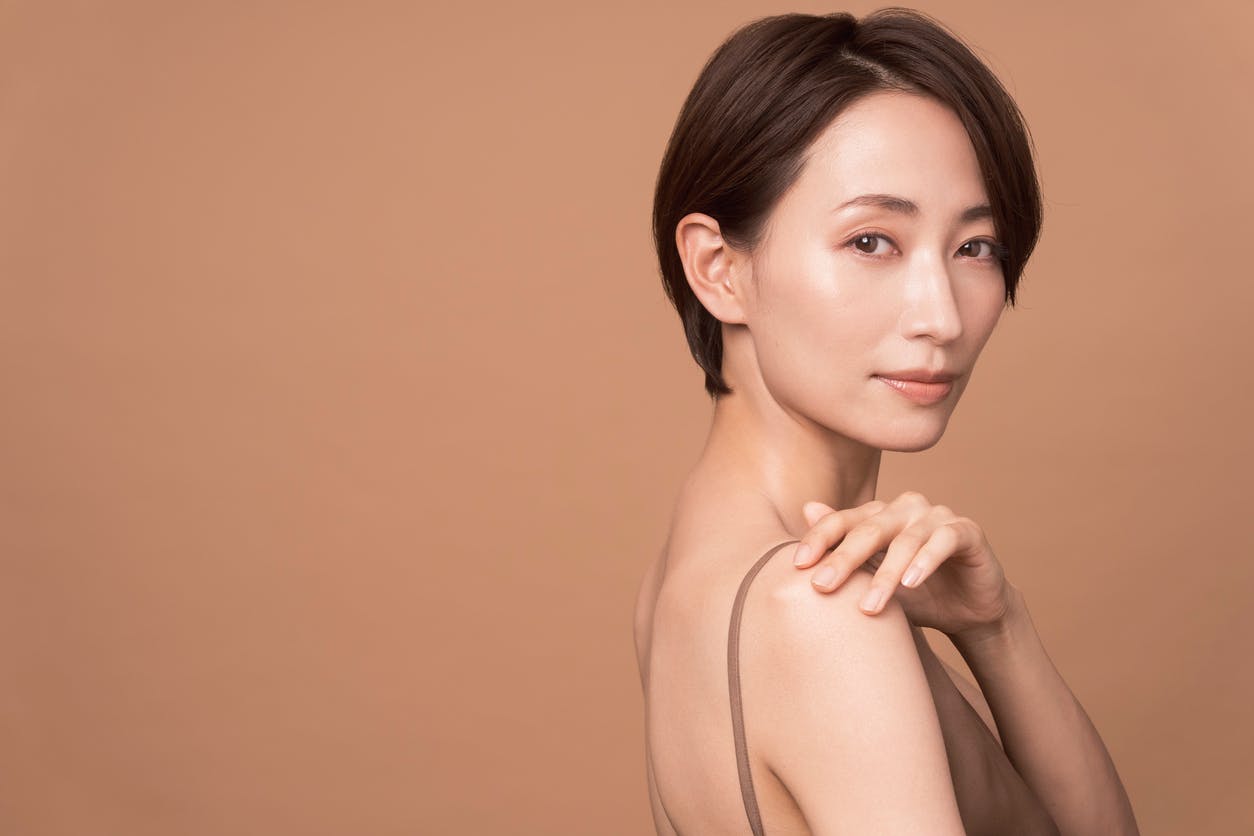 Beautiful older asian woman in studio shoot