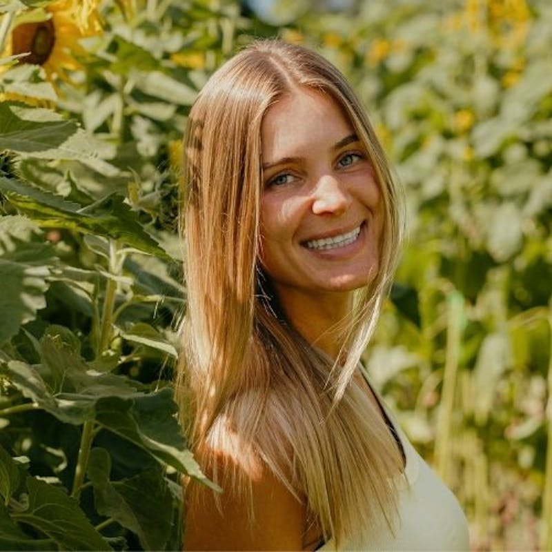 woman in sunflower field