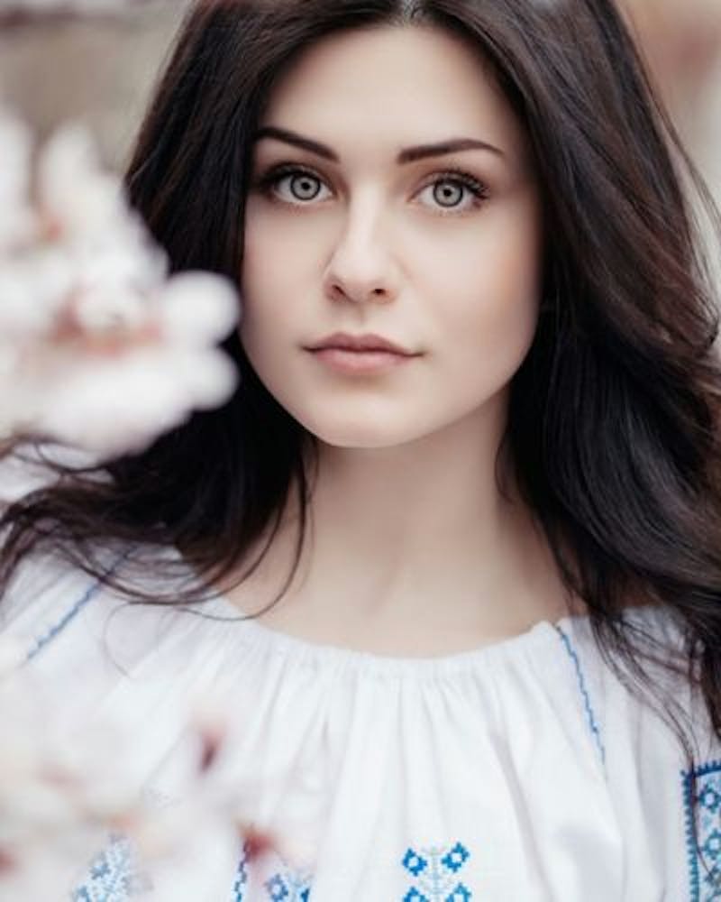 woman in white top