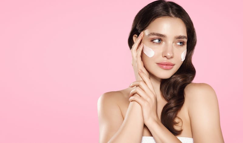 woman with face cream