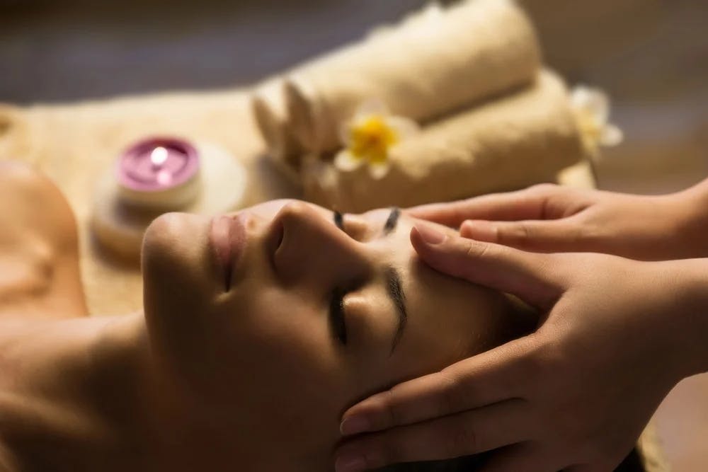 woman getting a face treatment