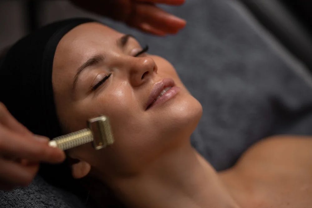 woman getting face treatment
