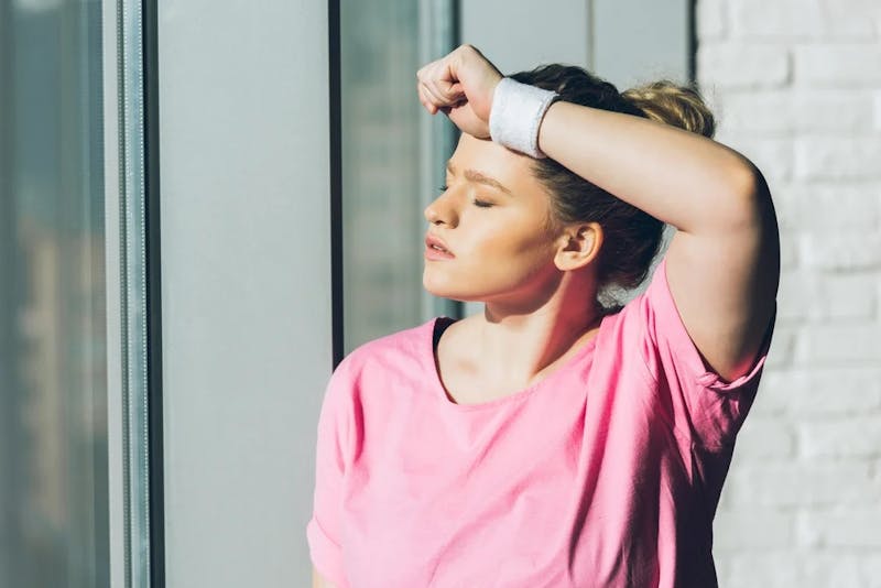 woman sweating in the sun