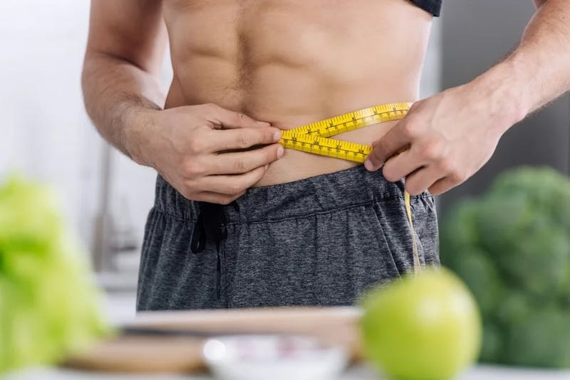 man with tape measuring