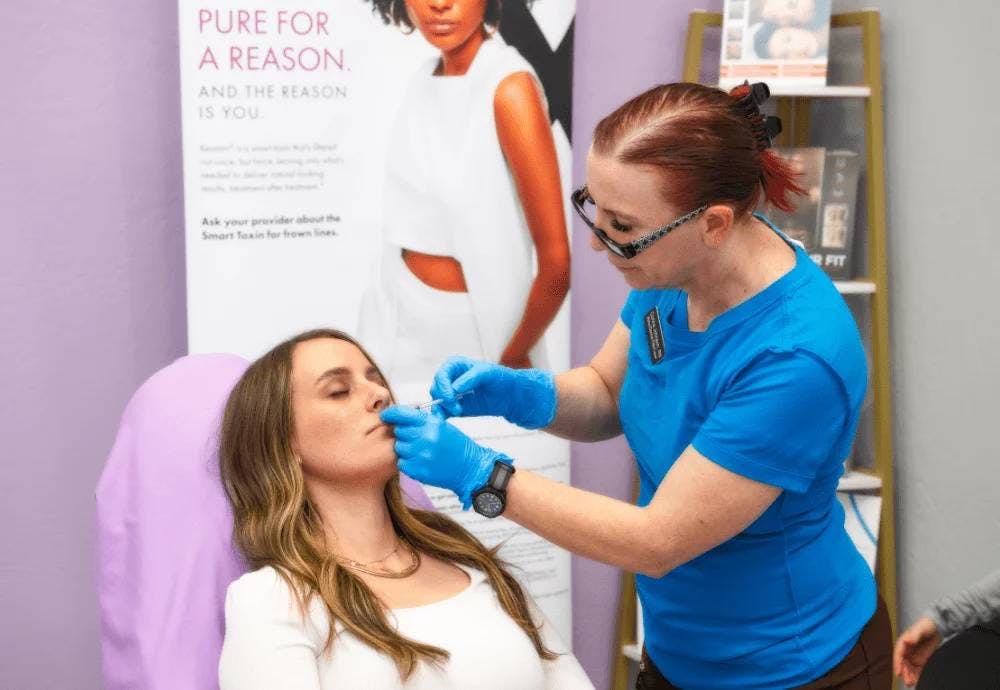 woman getting lip injections