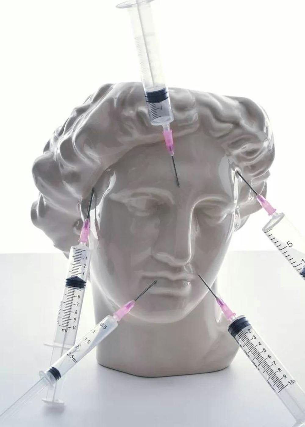 scultpture getting injections