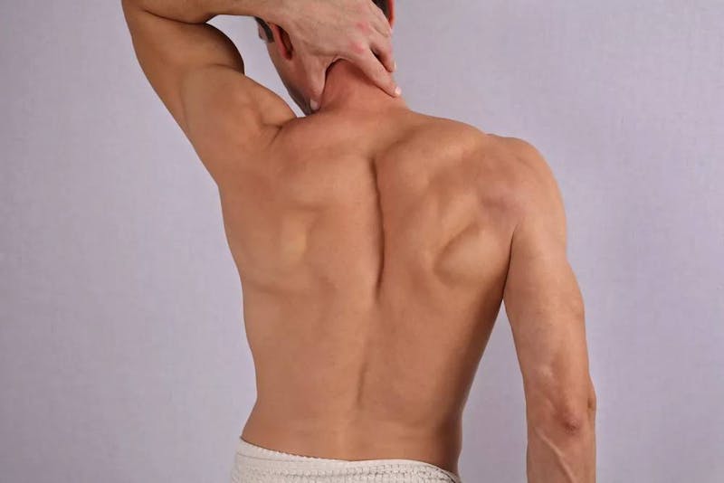 man's back