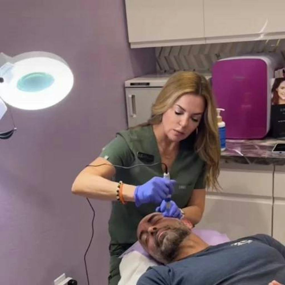 man getting facial treatment