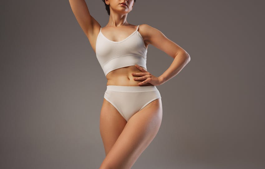 Woman in white bra and underwear
