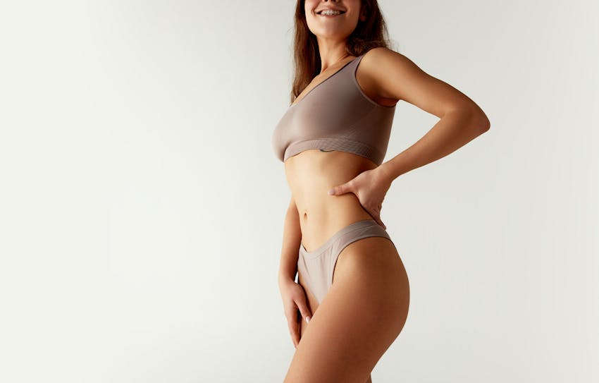 Woman in brown bra and underwear