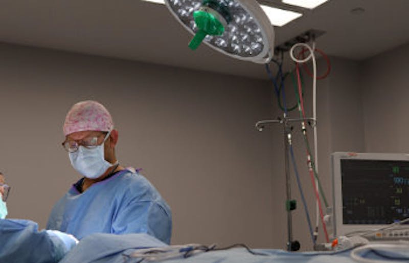 doctor performing surgery