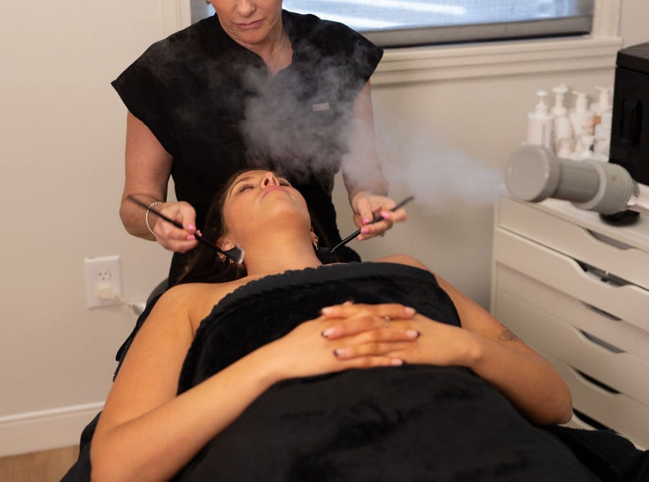 woman getting facial treatment