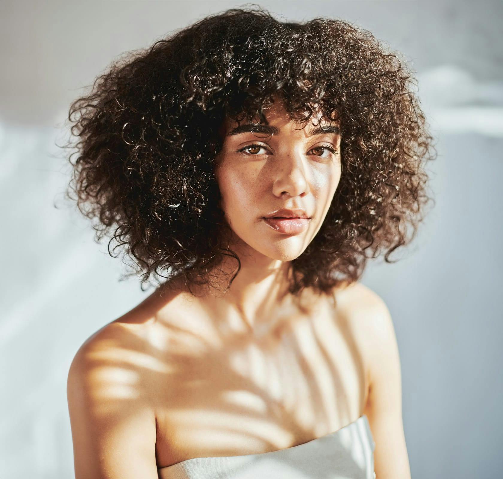 curly haired woman