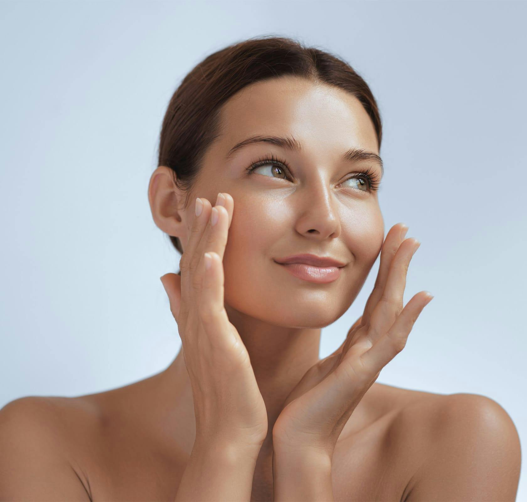 woman with hands on her face