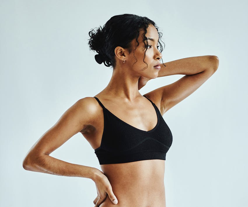 woman wearing a black sports bra