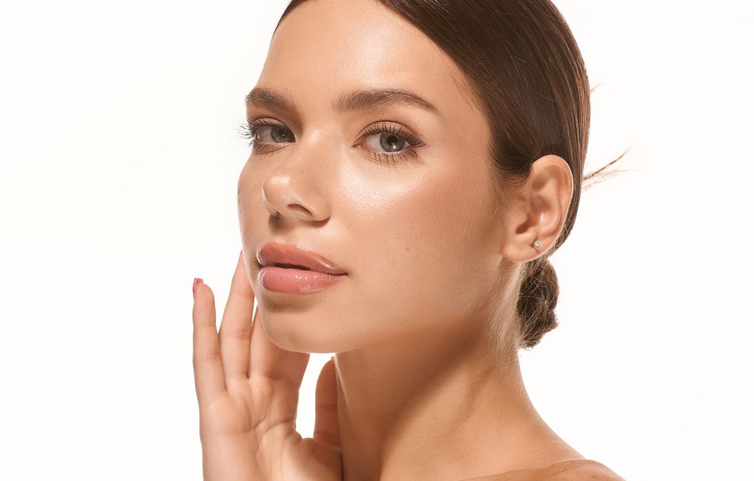 Woman touching her cheek