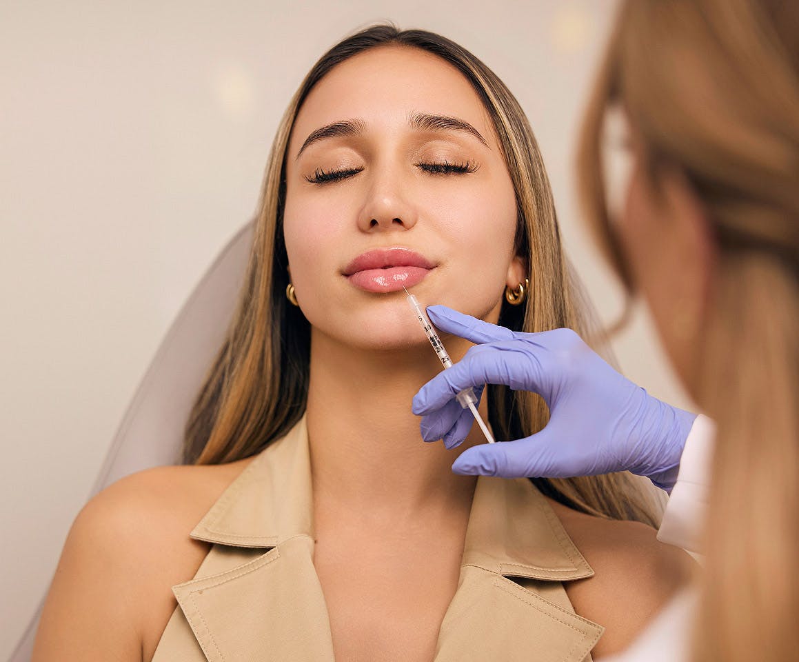 woman getting lip injection