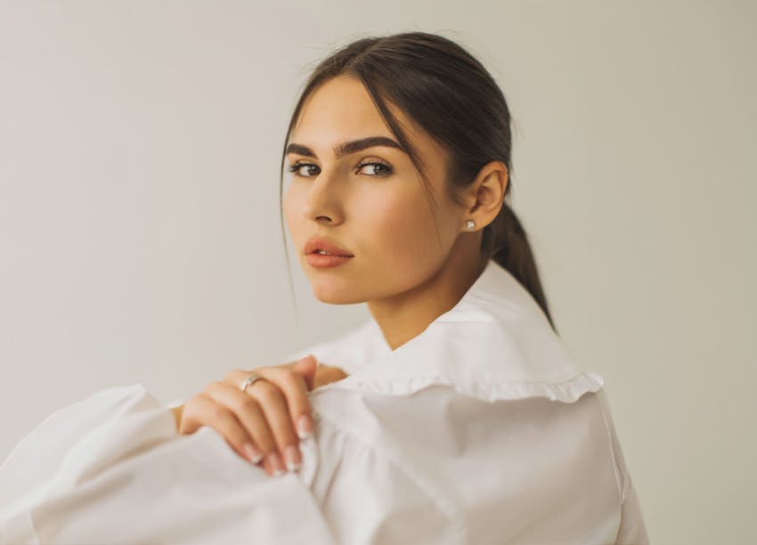 Woman looking over shoulder