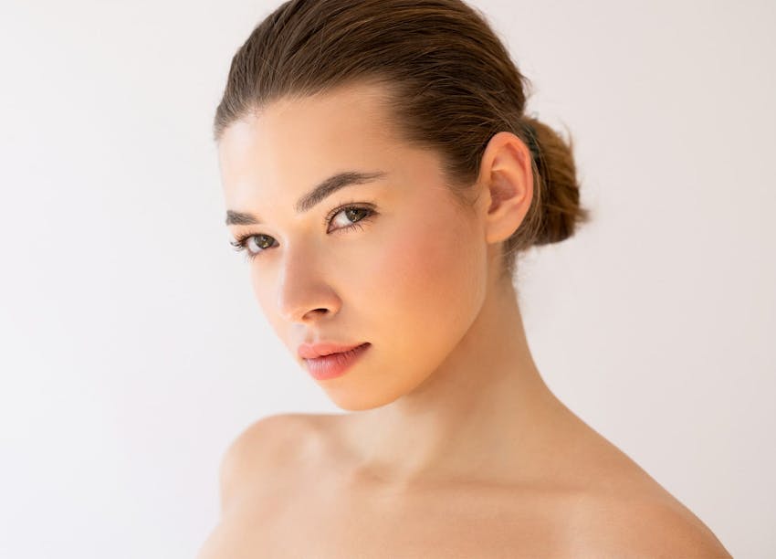 Woman in bright lighting