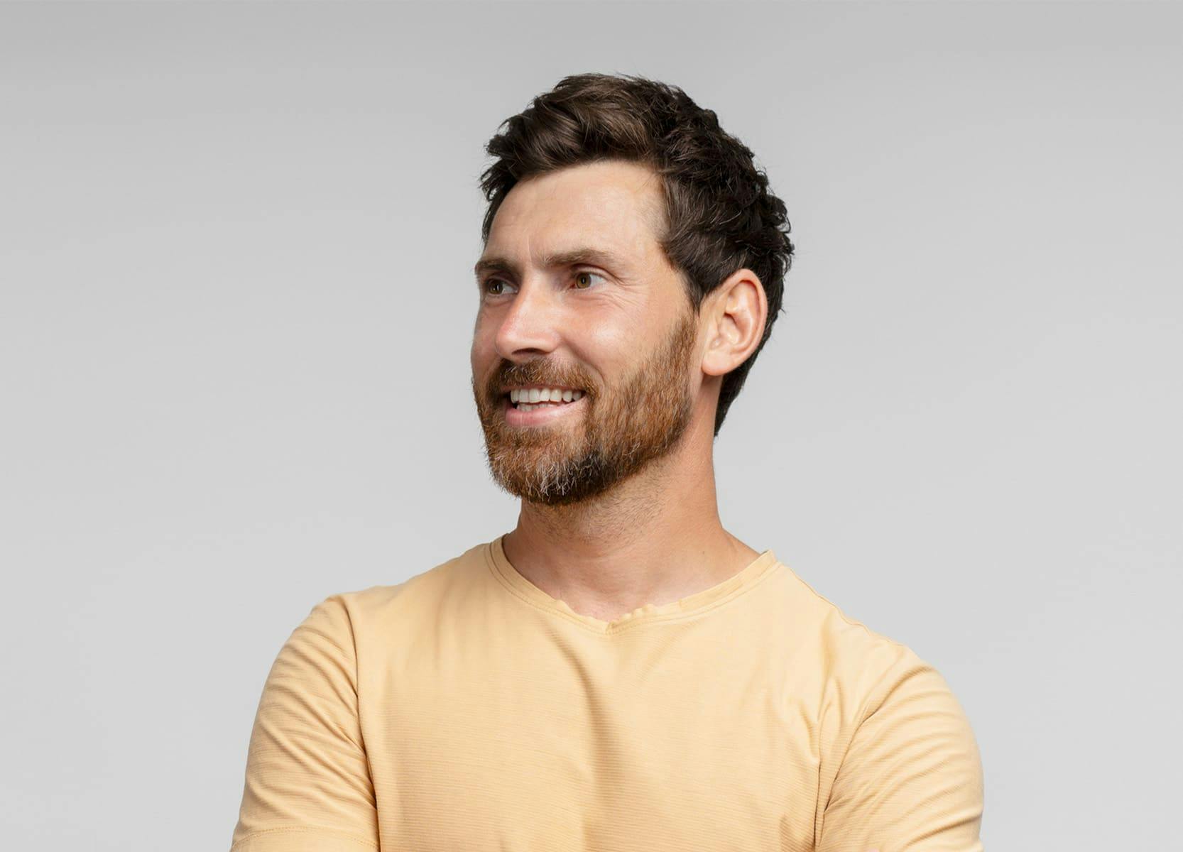 Man with beard smiling