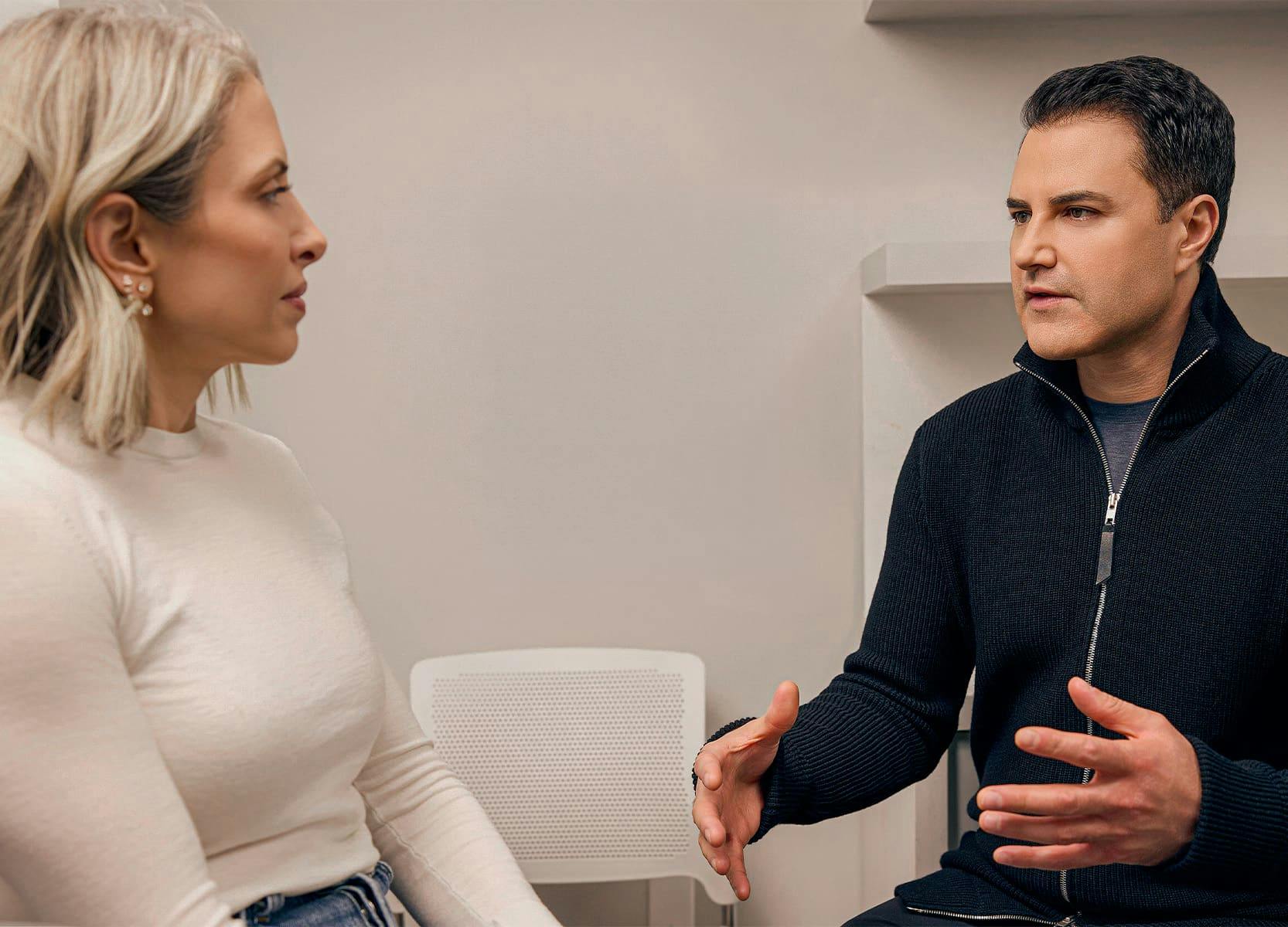 Woman and doctor speaking