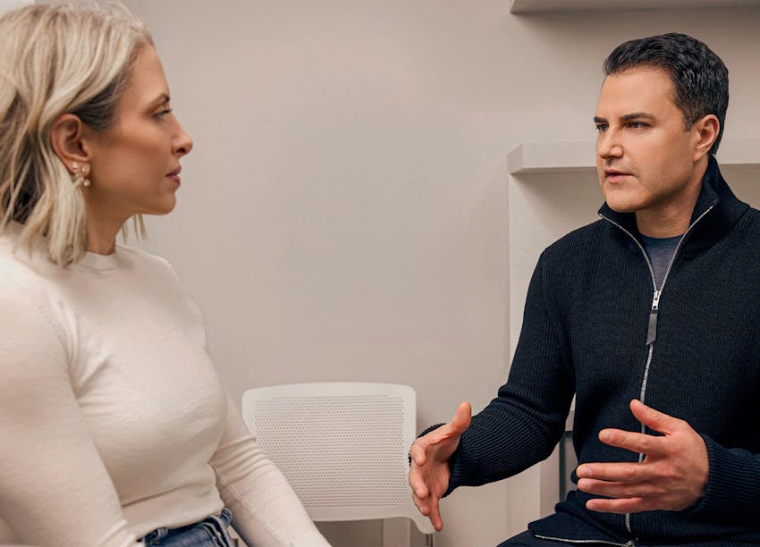 Woman and doctor speaking
