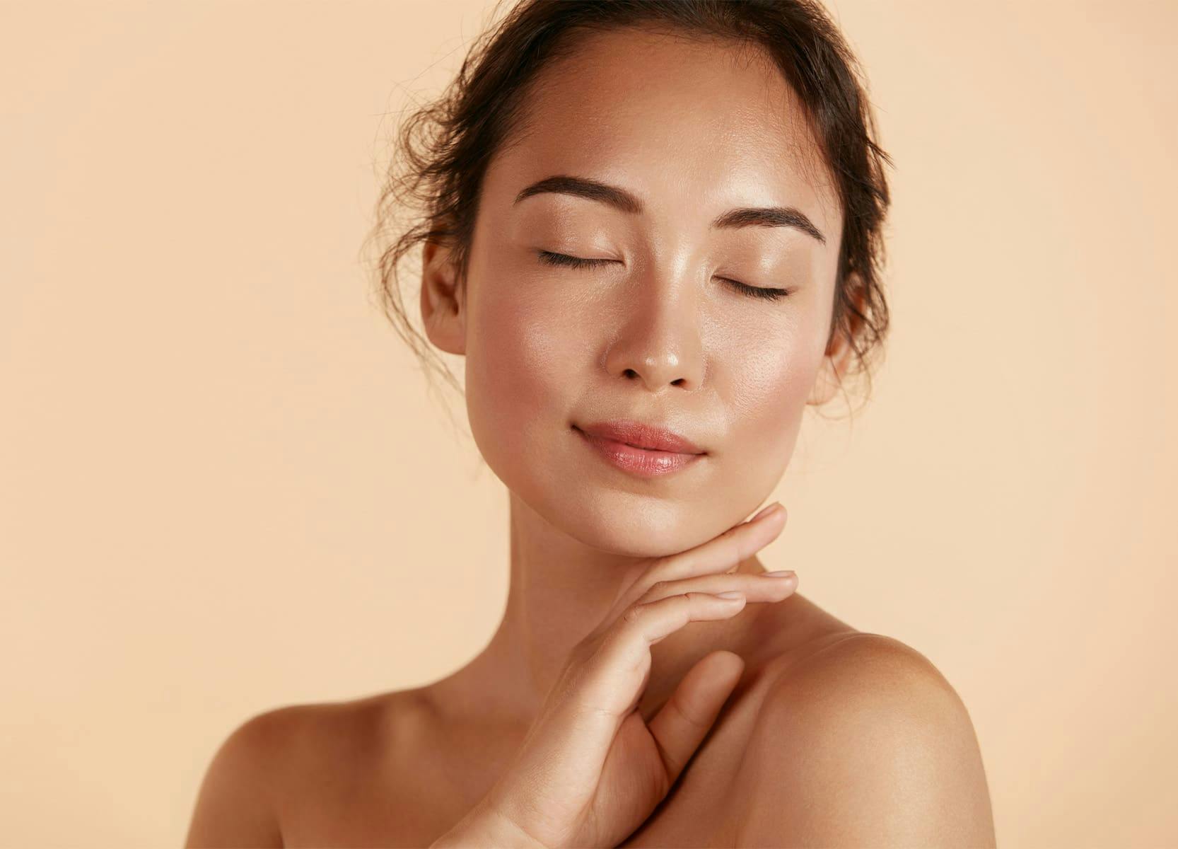 Woman touching her chin