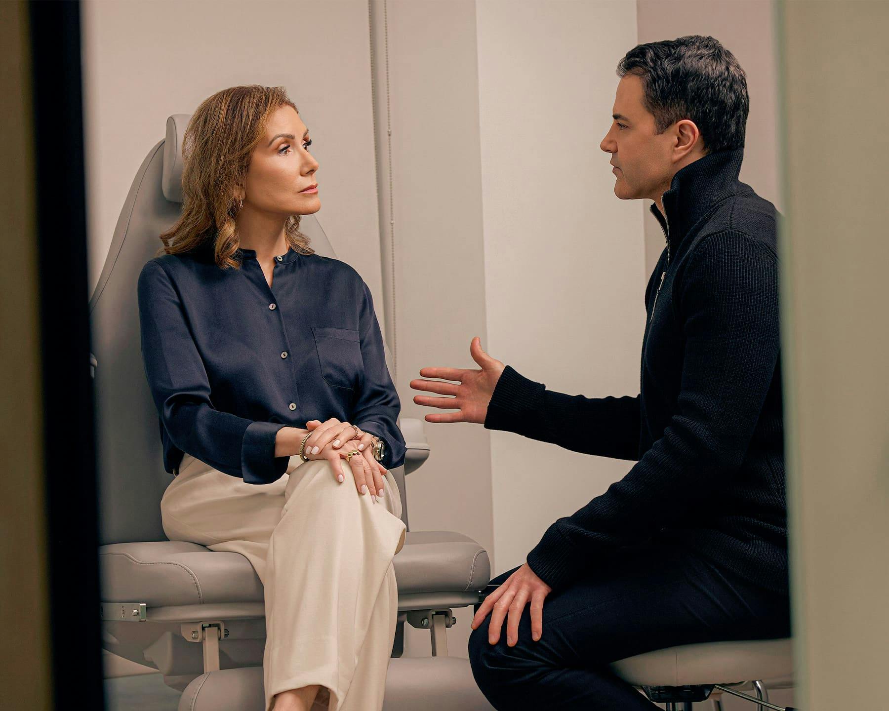 Woman speaking to doctor