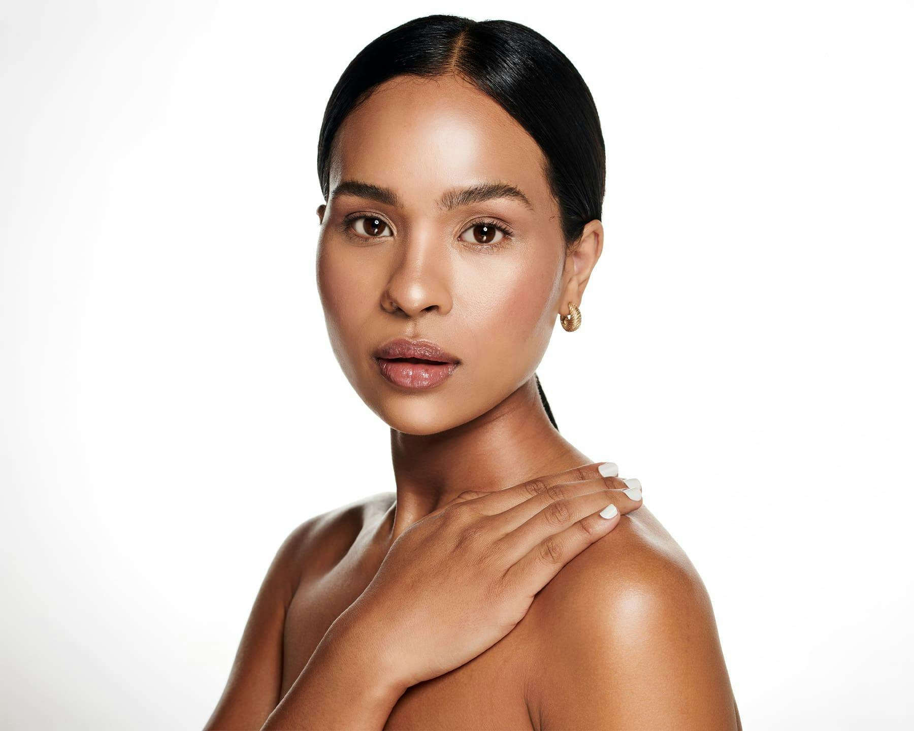 Woman touching her chest