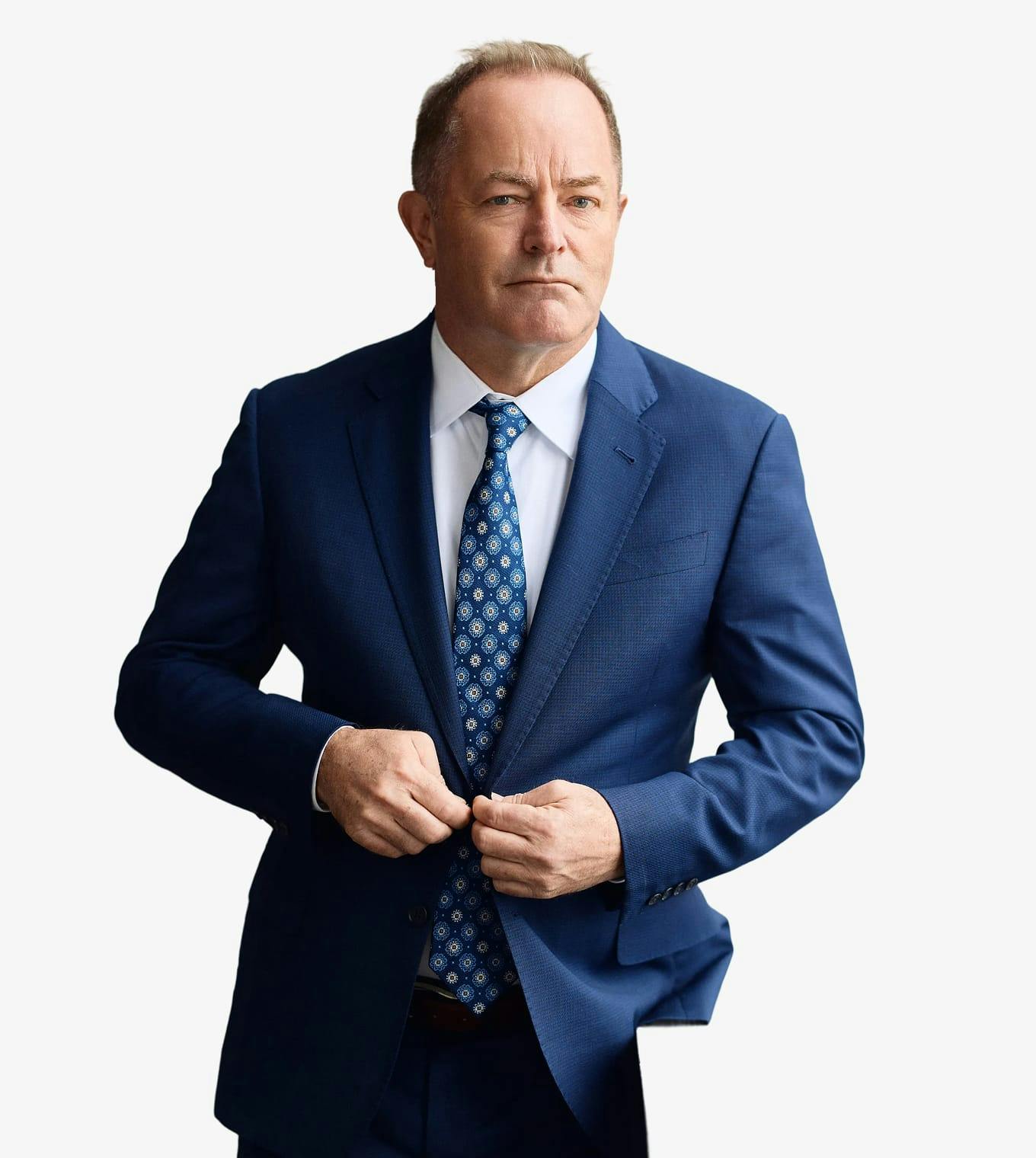 Todd Flood posing in suit