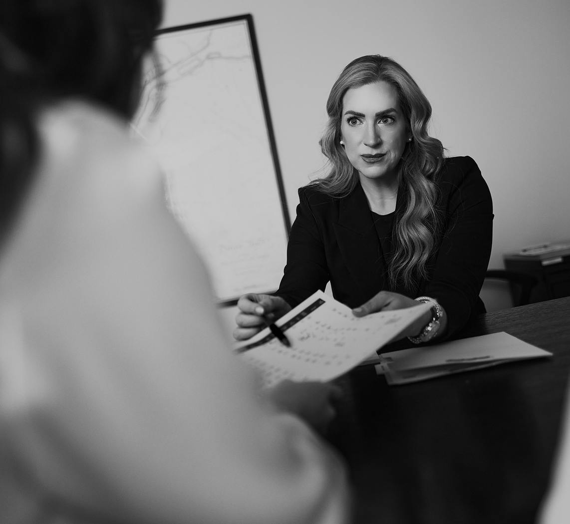 Lawyer speaking with client