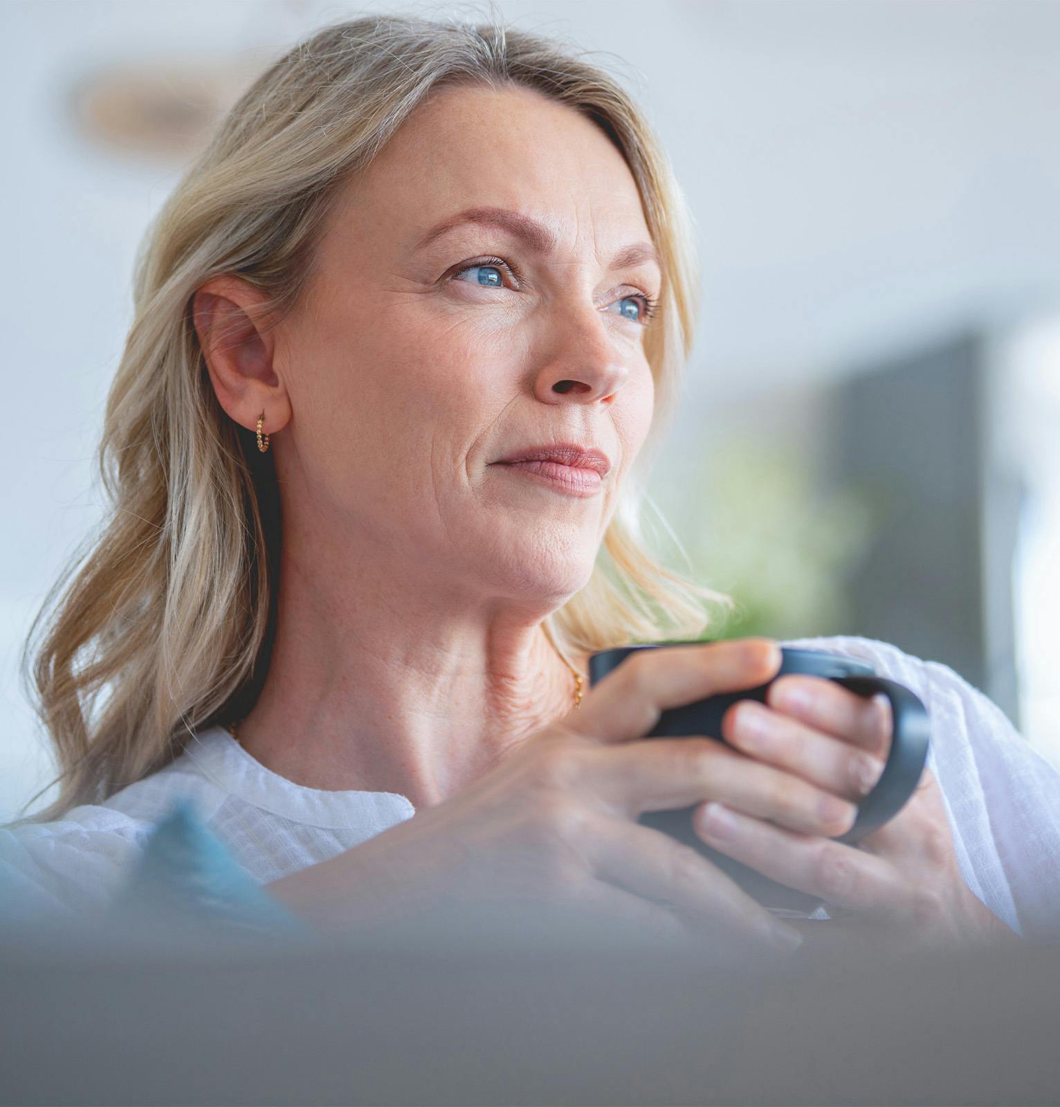 Woman holding a coffee mug