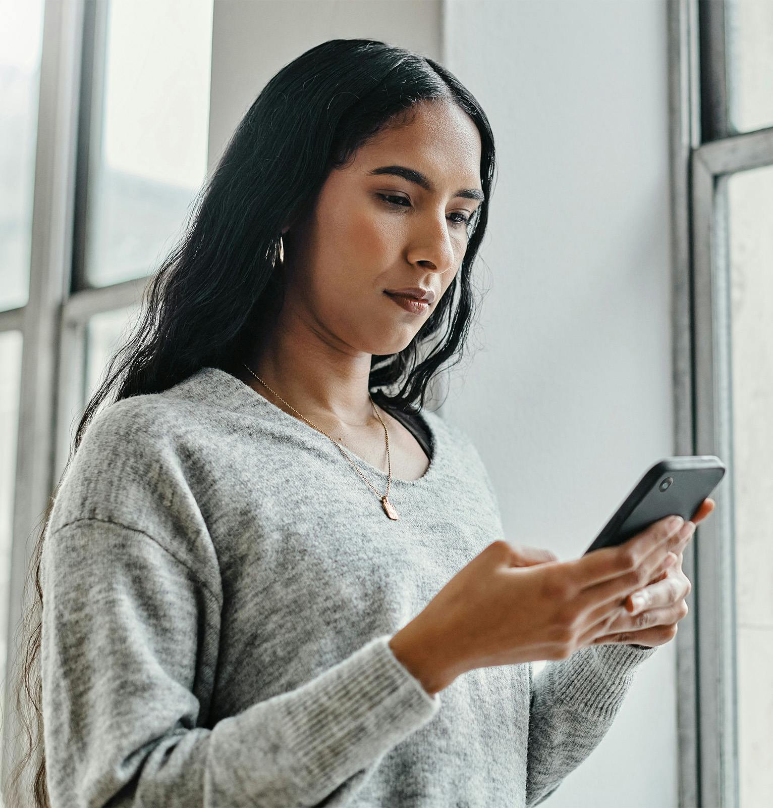 Woman looking at her phone