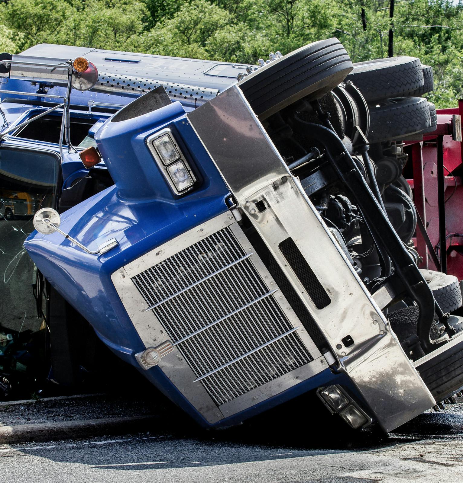 semi truck on its side