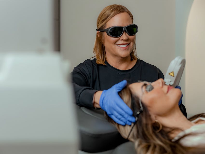 woman getting laser treatment done