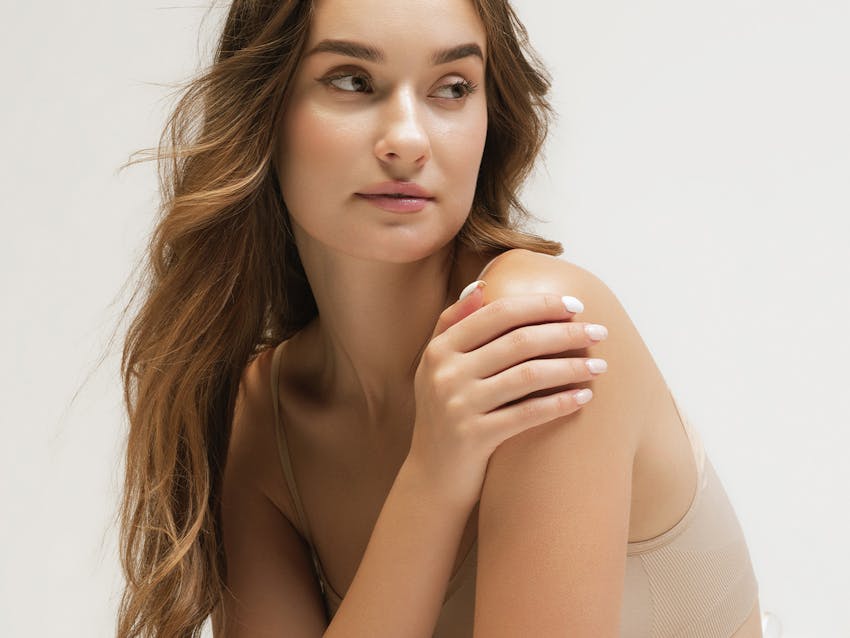 woman looking over her shoulder