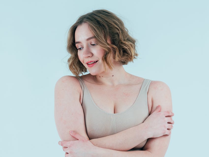 Women hugging herself