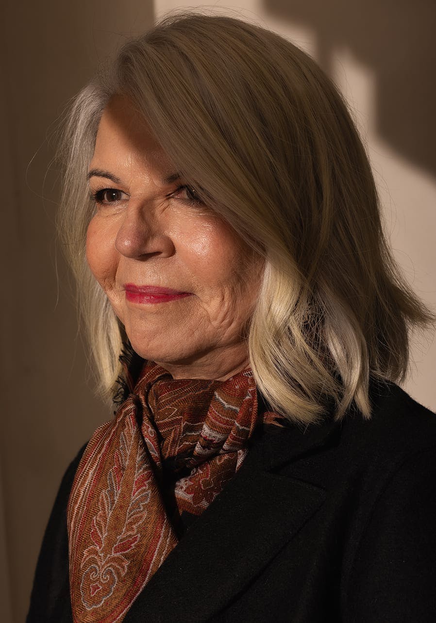 woman wearing a scarf around her neck
