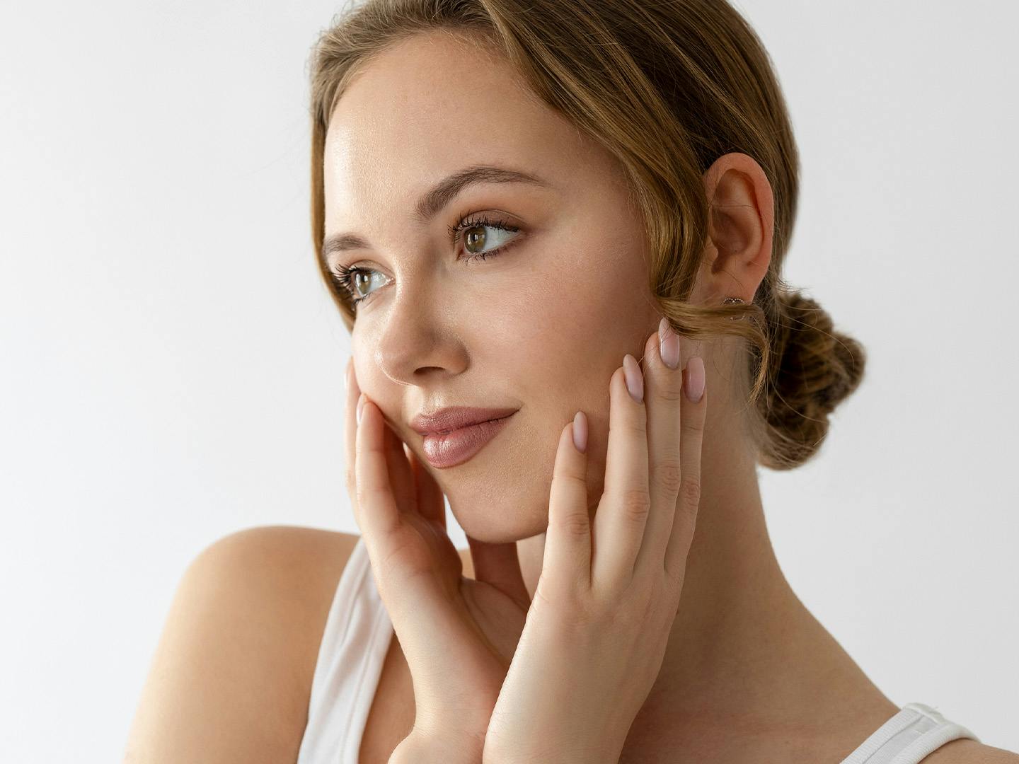 woman with hands on face
