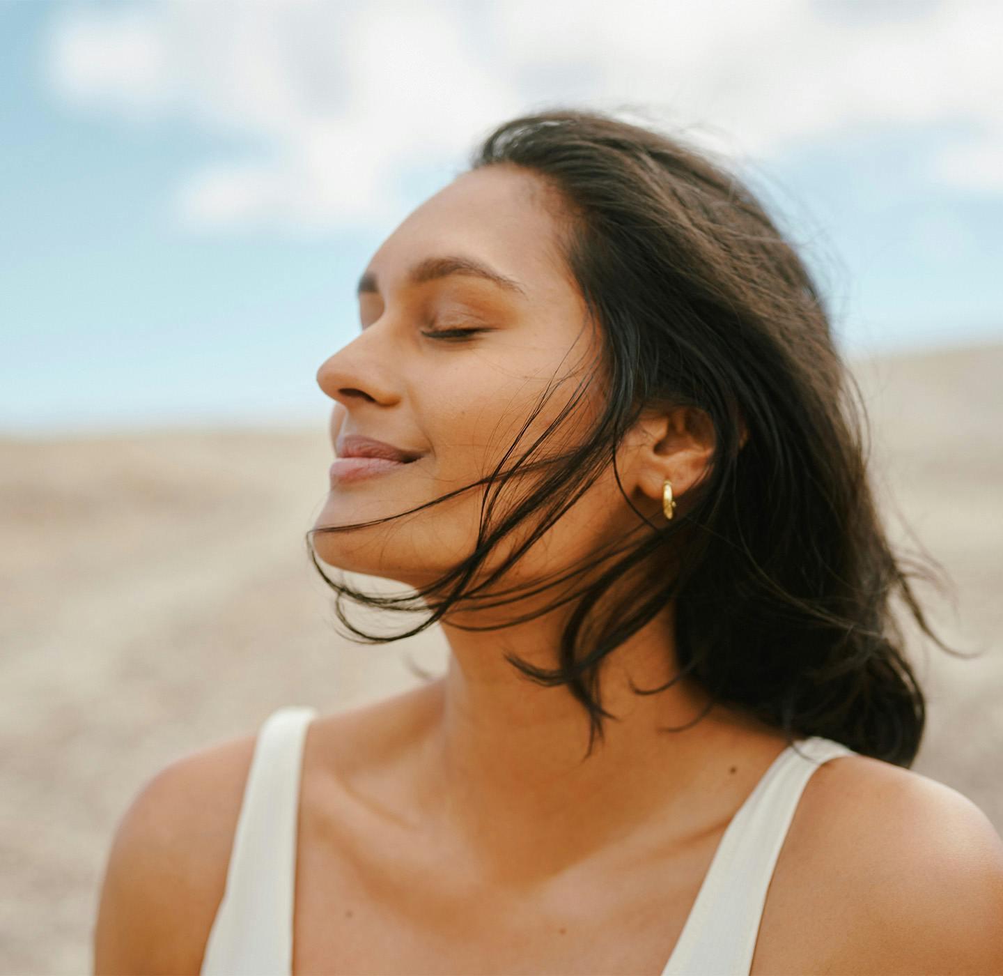 woman with hair blowing in the wind