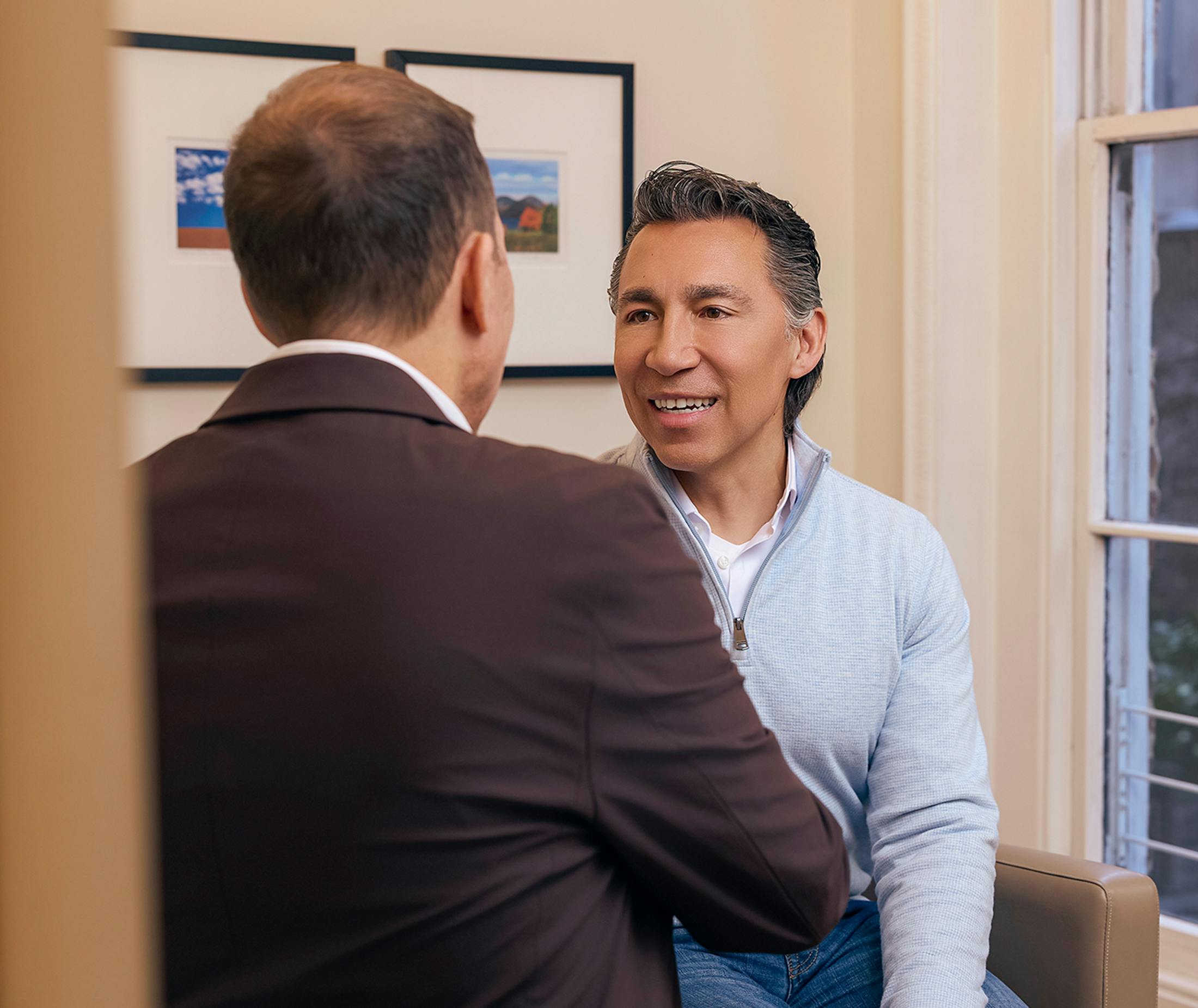 Two men talking