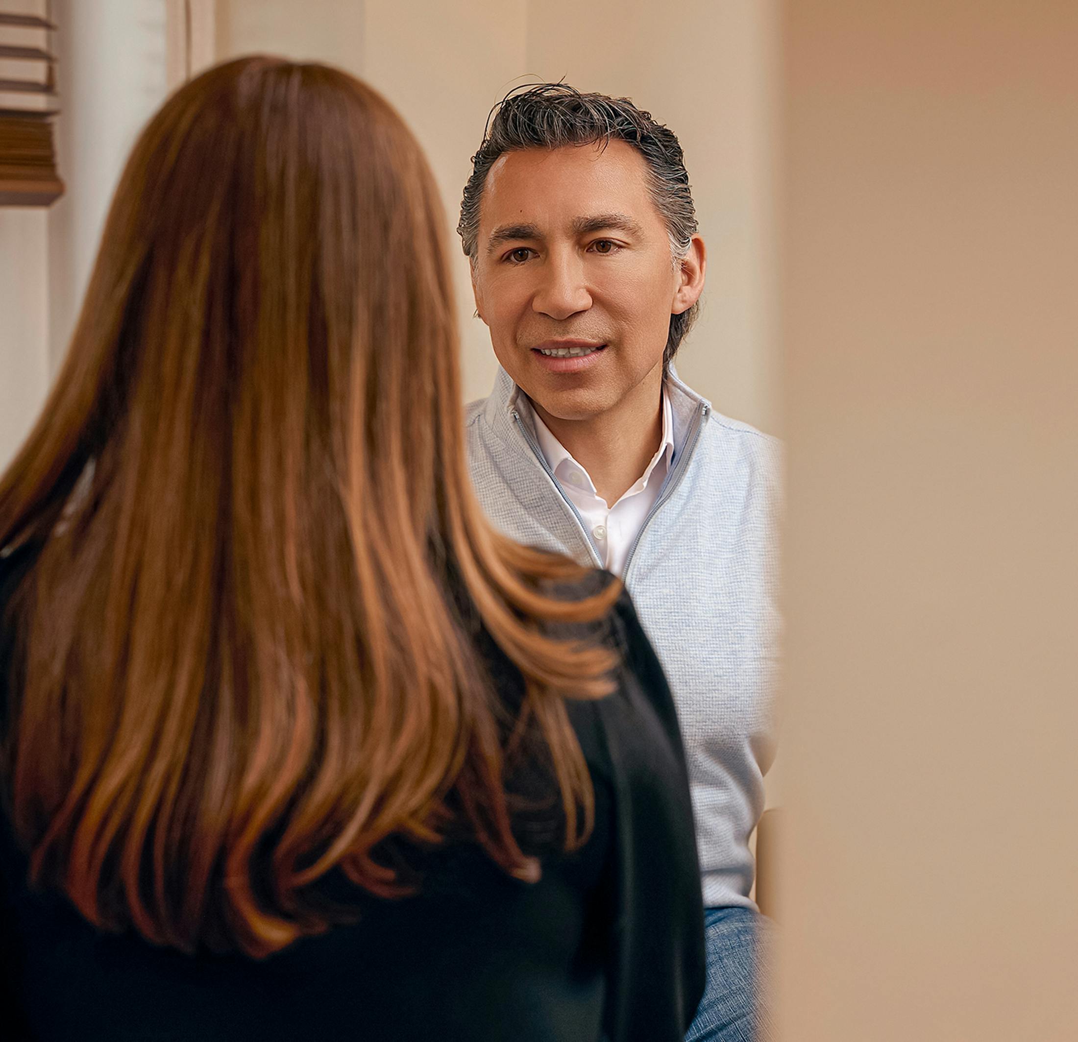 a man and woman talking
