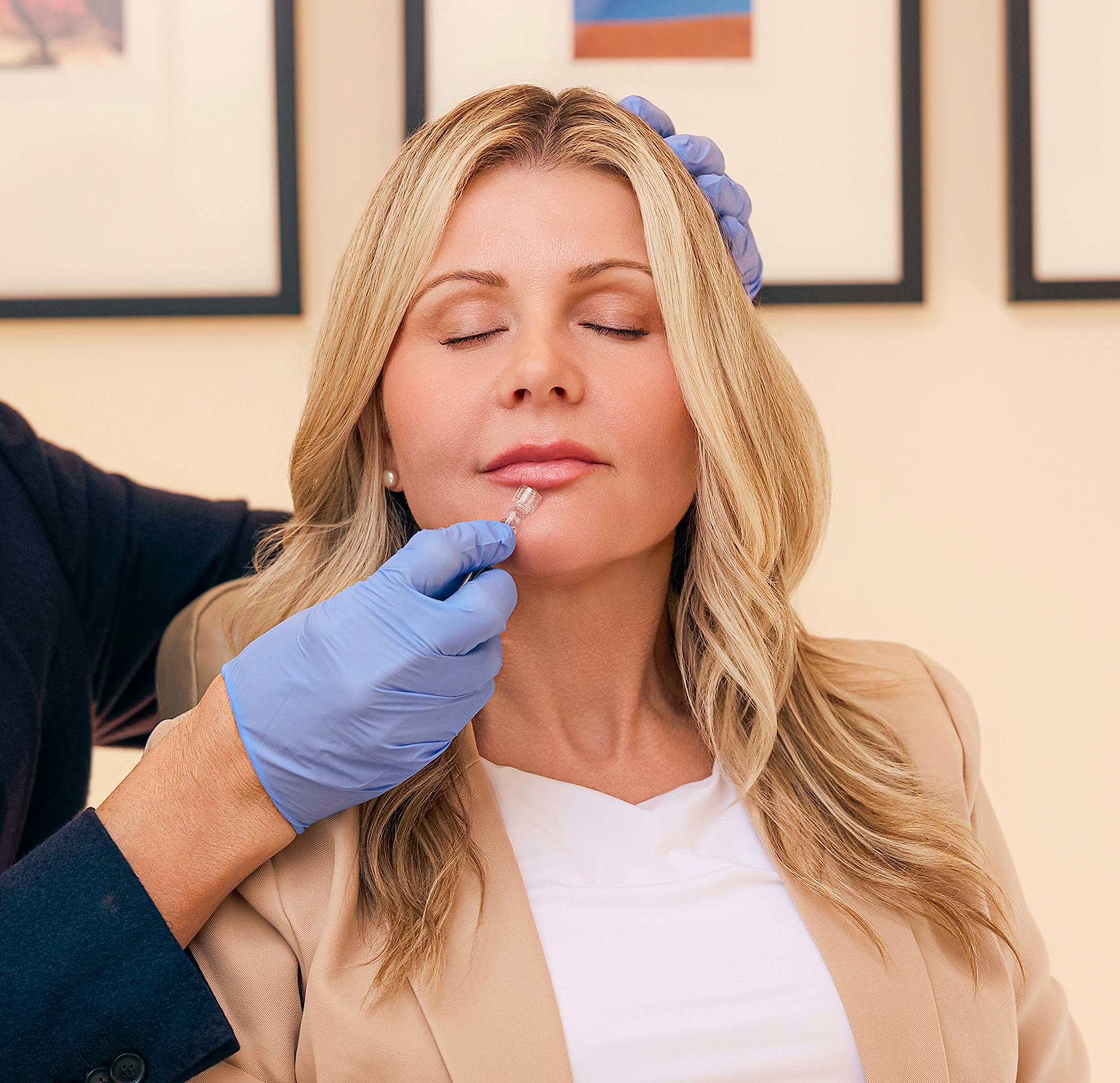 Woman getting lip filler