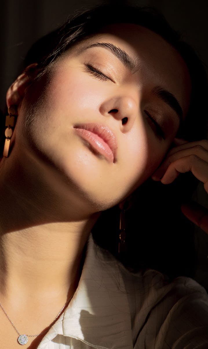 woman with her eyes closed