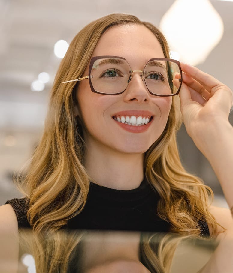 Woman wearing glasses smiling
