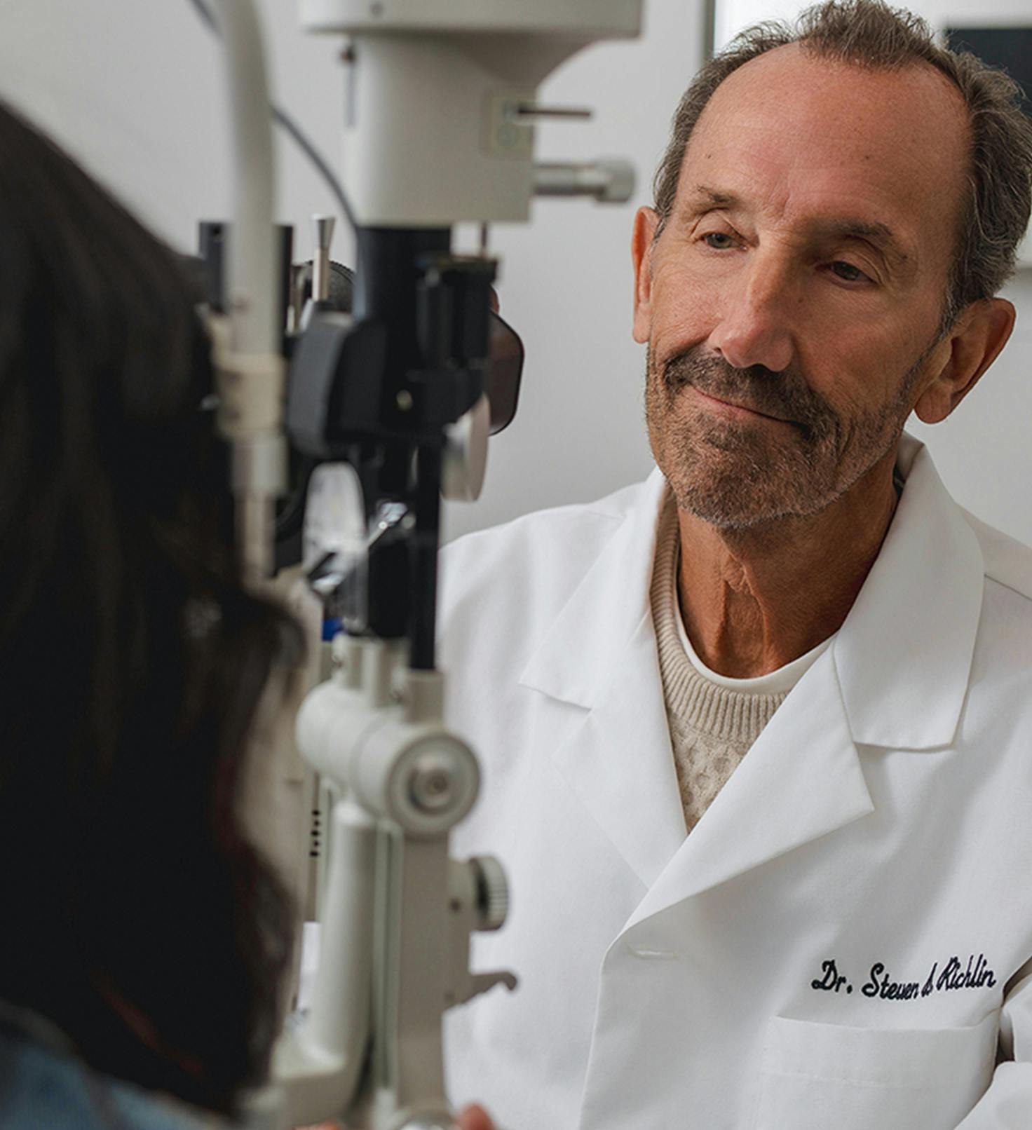 Doctor evaluating patient